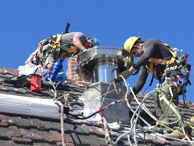 Protective chimney cap installed by Winchester Chimney Sweep in Winchester, CT