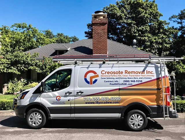 Winchester Chimney Sweep technician removing creosote safely in Winchester, CT