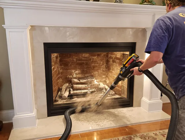 Fireplace cleaning performed by Winchester Chimney Sweep in Winchester, CT