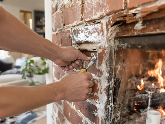 Routine fireplace repair by Winchester Chimney Sweep in Winchester, CT